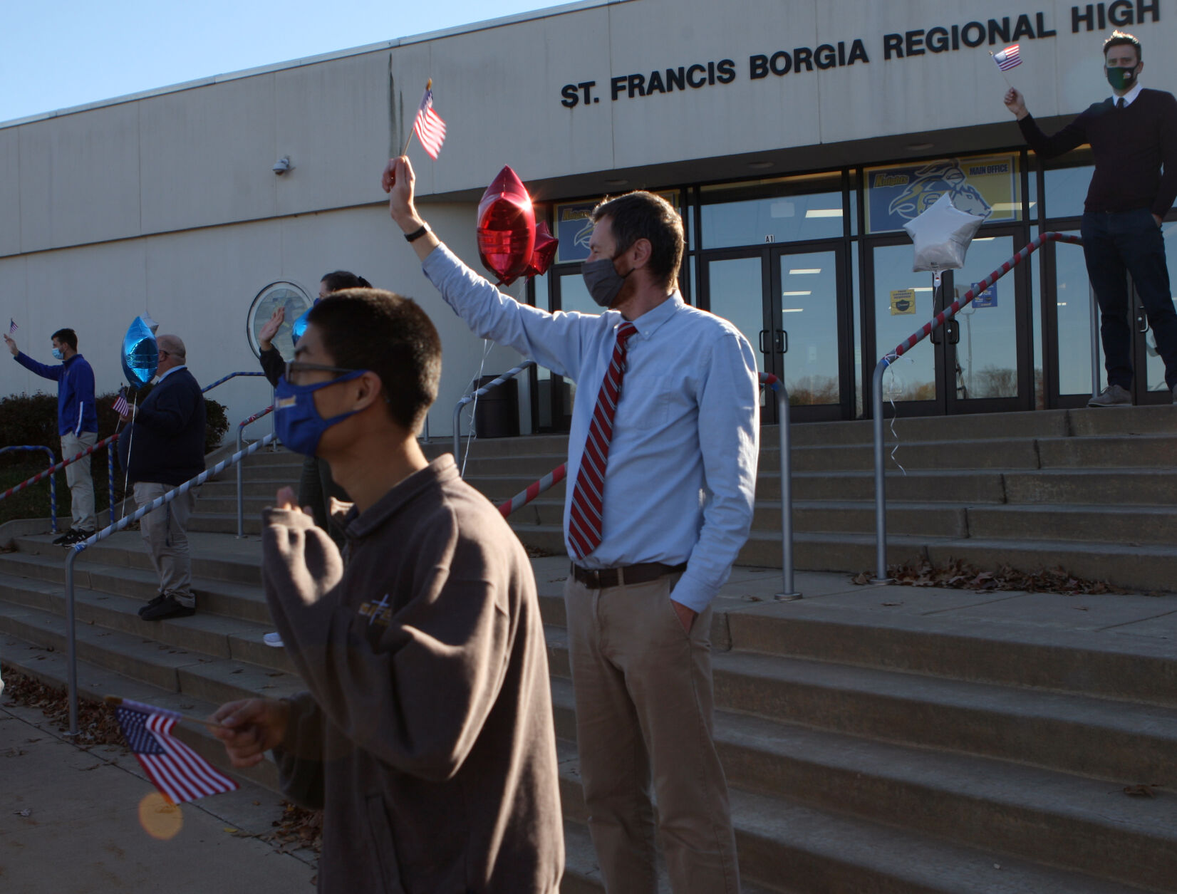 Nathan Caldwell waves a flag